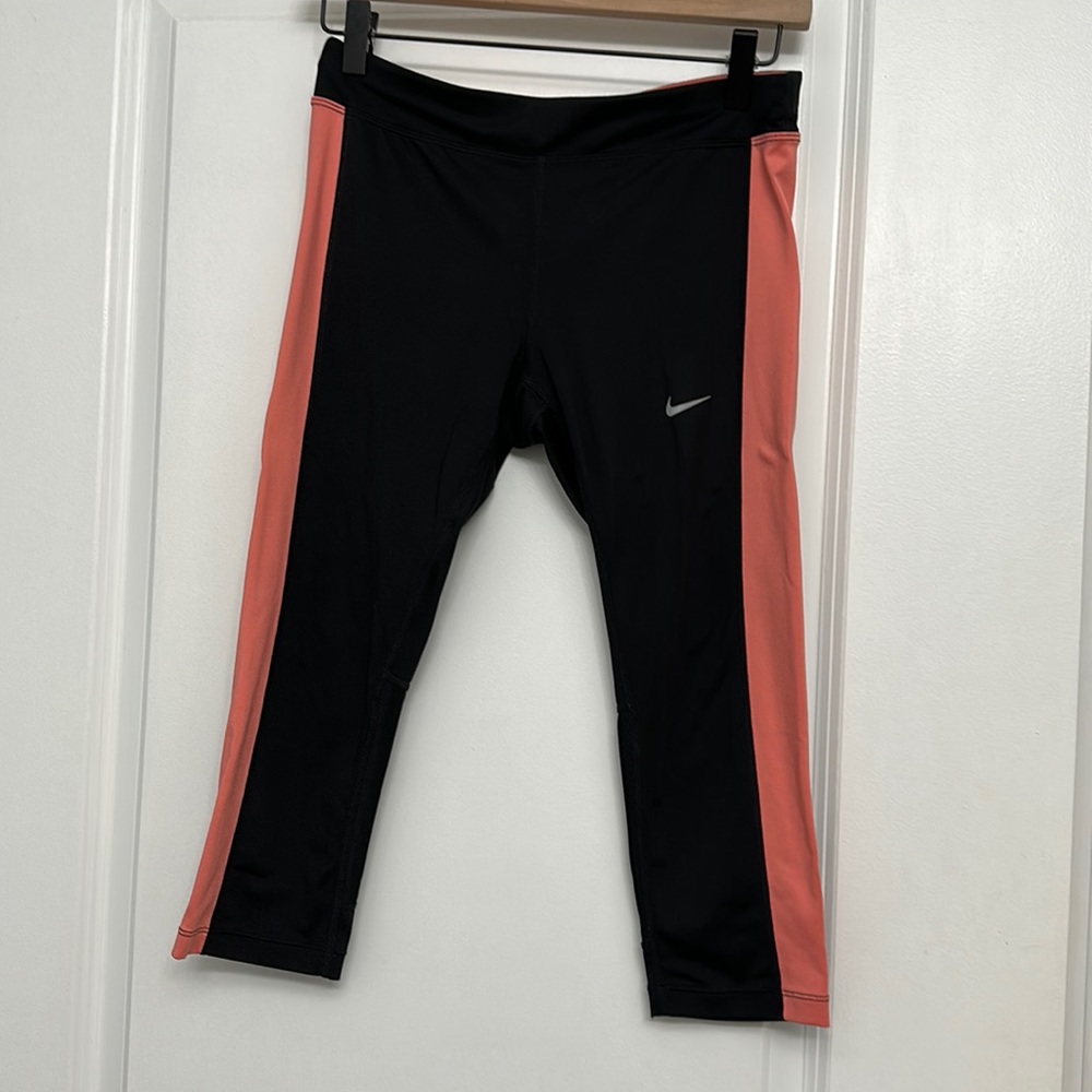 Peach and black NIKE capri leggings. Size S.